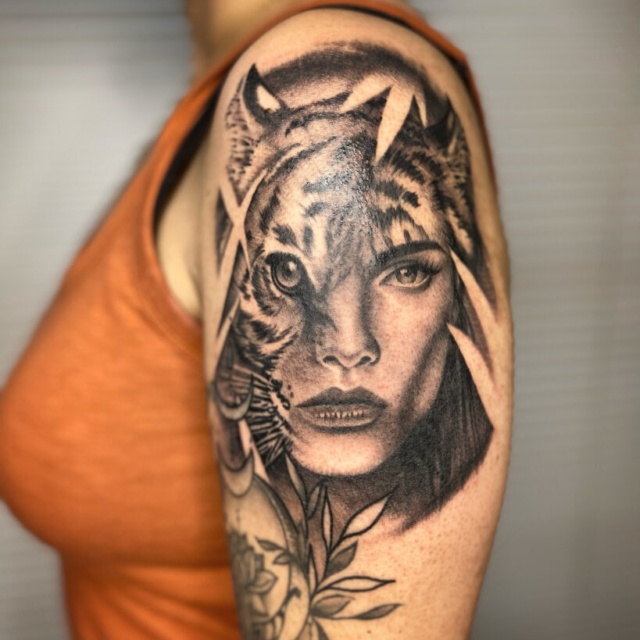 realism black and grey tattoo by Zac