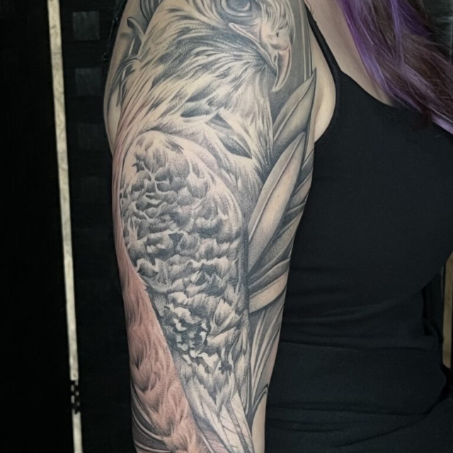 Black and grey realism Hawk sleeve by Emily